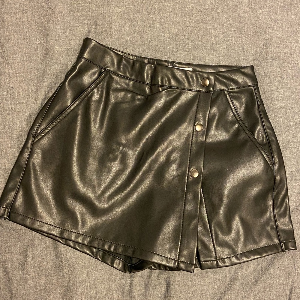 Black faux leather skort.